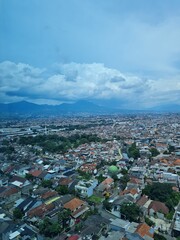 Fototapeta premium aerial view of the city cloudy window view