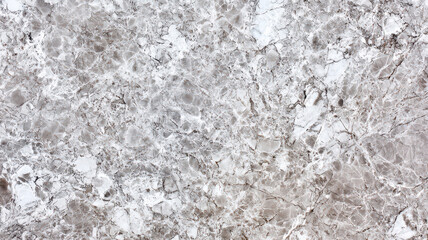 Obraz premium A clean, glossy marble texture with subtle veining in white and gray tones, reflecting light softly for an elegant and modern aesthetic.