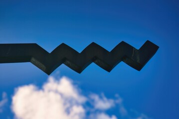 Wild Atlantic Way sign in Donegal Ireland - A stunning and scenic view of a tranquil coastline enriched with vibrant greenery and calm, serene waters © 4kclips
