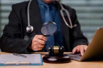 Medical professional examines legal documents with magnifying glass, symbolizing critical relationship between healthcare and law in ensuring ethics and compliance within medical field