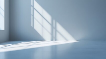 Fototapeta premium Studio wall features a gradient of grey and white, providing a versatile backdrop for adding text or images