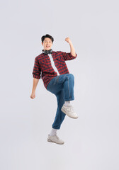 Full body image of young dynamic Asian man posing on white backgroundmage