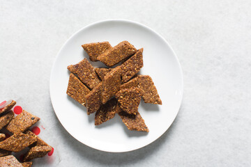 Overhead view of groundnut cake , top view of nkatie cake or peanut cake, flatlay  of nkate candy bar made with roasted peanuts and sugar