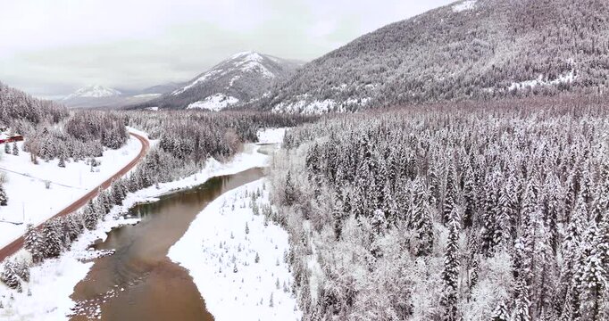 Snowy Hills and Flathead River Aerial Drone Glacier National Park