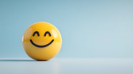 Fototapeta premium Smiling emoticon on a light blue background. Positive vibes!