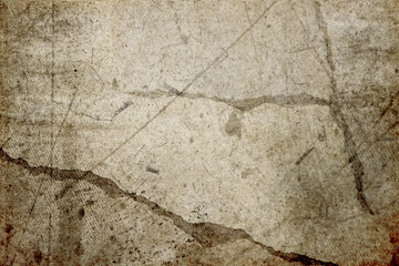 Cracked concrete floor, paper textured image