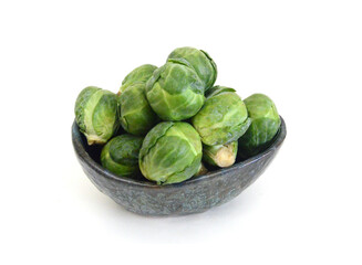 Apile of Brussels sprouts on a white background