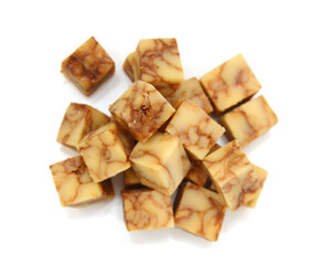 Cubes of cheddar cheese isolated on white