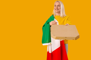 Mature woman with flag of Italy and pizza on yellow background