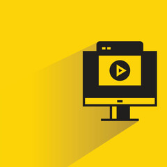video in computer icon with shadow on yellow background