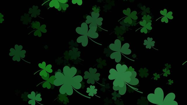 animation of shamrocks falling on a black background