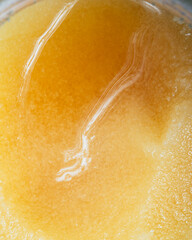 Bee honey in a jar close up