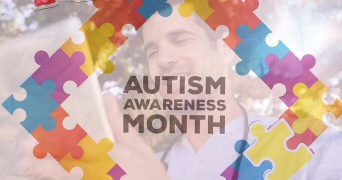 Caucasian man smiles behind a colorful puzzle pattern, with copy space