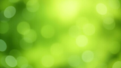 Green bokeh textured background with soft, defocused lights and a smooth gradient effect, lights, defocused