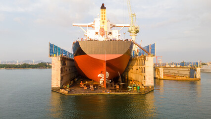 Propeller of large ship spinning power working and water splash contrail . Close up image detail...