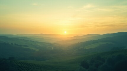 Misty Sunrise Over Green Valley with Rolling Hills