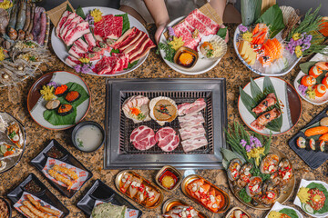 Gourmet Spread of Korean BBQ and Sushi Delights
