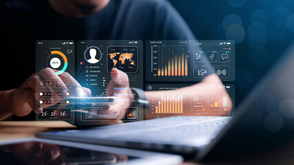 smart home app on the room; circular interface of the smart home automation assistant on the virtual screen and user touches the button; smart home digital interface