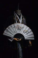 Traditional Chinese fan with floral embroidery in Asian Arts Museum