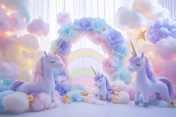 A colorful unicorn scene with three unicorns and a rainbow arch