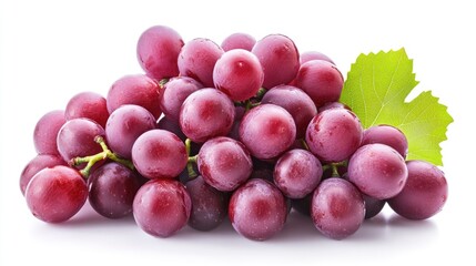 Fototapeta premium Vibrant clusters of fresh red grapes with green leaf isolated on pure white background perfect for healthy food and beverage concepts