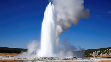 Geyser Erupting with Dramatic Steam Plume against Clear Blue Sky in Scenic Natural Landscape
