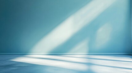Tranquil light blue wall with soft shadows creating a serene and calming atmosphere for interior designs or backgrounds.