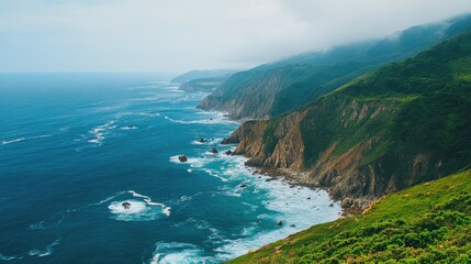 Naklejka premium Scenic coastal landscape showcasing cliffs and ocean waves under a cloudy sky emphasizing the natural beauty of the shore.