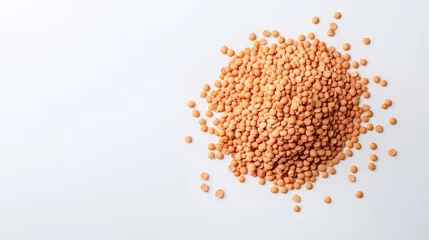 Heap of raw red lentils on a white background showcasing food ingredient in a top view perspective for culinary uses and recipes. © AbstractAI