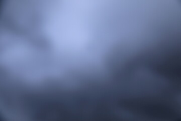 雲をぼかしたグレイの背景素材
