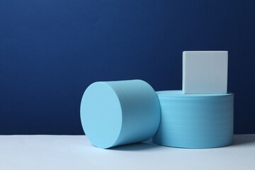 Varoius podiums on color background 