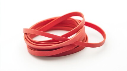 Naklejka premium Flexible Red Rubber Bands Isolated on Clean White Background for Office and Craft Use