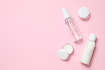 Natural cosmetic products on color background, top view