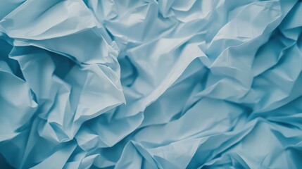 Obraz premium Crumpled blue sheets symbolizing unfulfilled desires and creative potential in artistic expression and emotional reflection