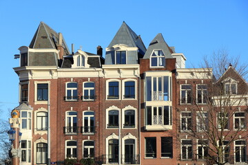 Naklejka premium Amsterdam Amstel House Facades with Blue Sky, Netherlands