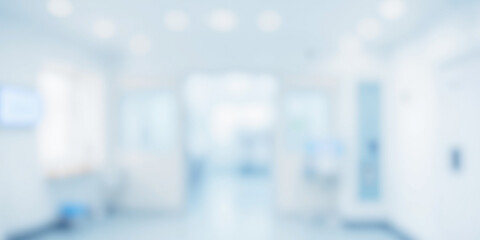 Blurred hospital interior background, modern clinic hallway with bright light, soft white walls,...