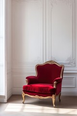 A luxurious red velvet chair with gold trim on empty white room