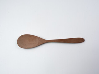 wooden spoon on white background