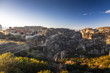 Sunset over Meteora. Amazing landscape of Monastery of the Holy Trinity from Meteora, iconic place for Greek people and orthodox around the world.