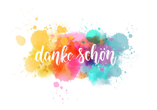 Danke schon - Thank you in German. Handwritten modern calligraphy watercolor lettering text. Colorful handlettering on watercolor paint splash