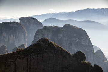 The mountains of Meteora. Amazing landscape with the cliffs and rocks from Meteora during a day with blue wky and spectacular clouds. Travel to Greece.