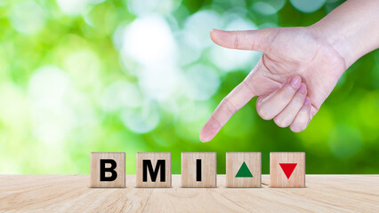 BMI big mac index symbol, Concept words BMI big mac index on wooden cube, Medicine and Body Mass Index concept, Doctor health.