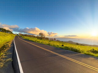 A road trip along the Maui South Piilani Highway during golden sunset hour