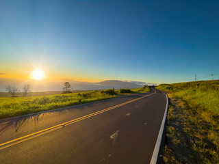 A road trip along the Maui South Piilani Highway during golden sunset hour