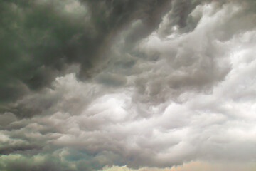 low gray clouds in the sky before the rain, overcast sky with dark clouds