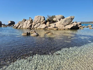 Plage de Tamaricciu, lonesome white beach with turquoise water at a beach in Porto Vecchio, South Corsica.