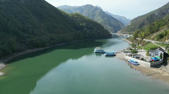 4K Drone Shot of Ferry Parked Cinematic Aerial View of Koman Lake Port