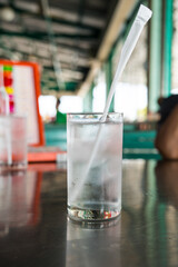 A glass of water with ice cubes