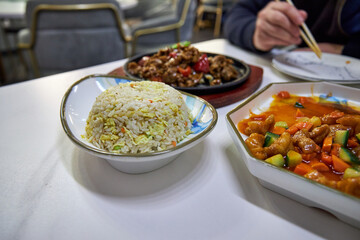 Chinese dish rice with vegetables in a Chinese restaurant close-up