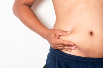 Naklejka premium Overweight or obese man on white background. Fat mens body measurements. he is dieting and losing weight. Men at risk for diabetes Belly fat. Healthcare, medicine concept
